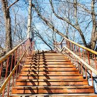 outdoor rusty metal steps on spring photo
