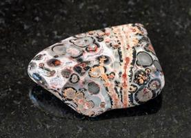 polished Leopard Skin Jasper Jaguar Stone on black photo