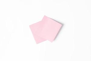 Pink stickers glued on top of each other on a white background. Stickers layout for message, announcement, copy space photo