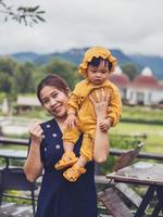 Asian mother and son of Thai nationality and nature at De mala Cafe, Thung Saliam, Sukhothai, Thailand. photo