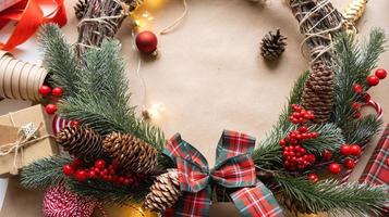 Making a Christmas wreath with your own hands. Holiday preparation, home decoration, New Year photo