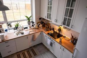 Festive Christmas decor and mess in the kitchen, cooking treats for the feast. New Year, mood, home interior photo