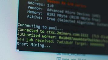Cryptocurrency mining on a computer screen. The algorithm of the computer program on the monitor. Execution of the program code for the mining program. Pop-up lines of a computer program. video