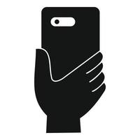 Smartphone in hand icon, simple style vector