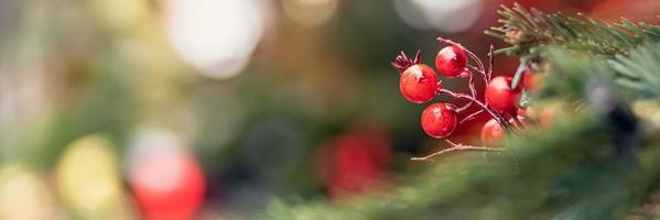 Christmas background of a Christmas tree decorated with Christmas toys. Winter holidays. New Year. photo