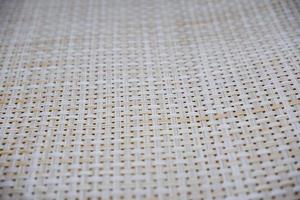 A textured dining table mat, great for serving as a food mat. photo