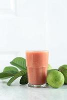 Pink Guava Fresh Juice in a Tall Glass photo