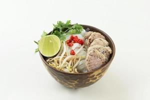 Pho Vietnamse Noodle Soup Famous Food on White Table. photo