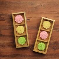Traditional Chinese Mid Autumn Festival Food, Colorful Rice Cakes Snowskin Mooncakes with Variety of Fillings photo