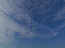 blue sky with puffy clouds background. Natural background. photo