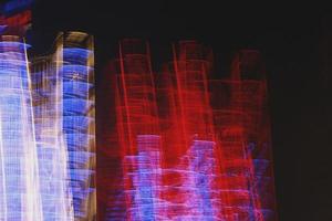 Long Exposure Photograph Of Vehicle Lights At Night In City photo