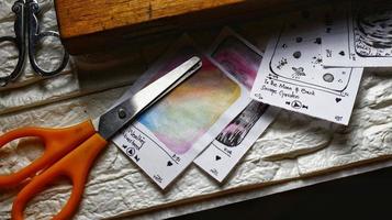 View Of Desk From Above With Arts Supplies On It photo