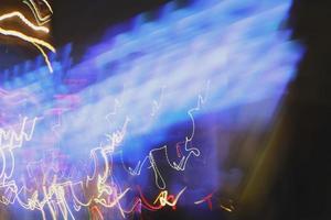 Long Exposure Photograph Of Vehicle Lights At Night In City photo