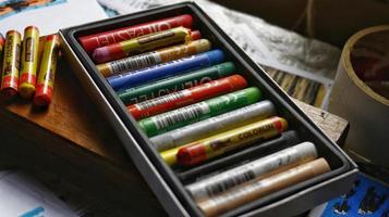 View Of Desk From Above With Arts Supplies On It photo