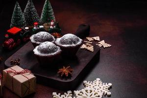 Sweet tasty fresh festive baking on a dark concrete background photo