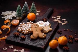 Beautiful Christmas decorations with holiday toys, clementines and gingerbread photo