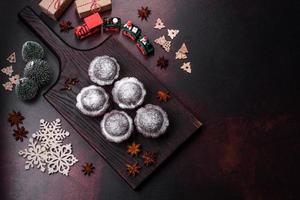 Sweet tasty fresh festive baking on a dark concrete background photo