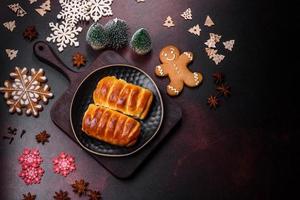 Sweet tasty fresh festive baking on a dark concrete background