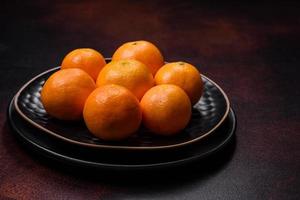 Beautiful Christmas decorations with holiday toys, clementines and gingerbread photo