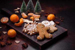 Beautiful Christmas decorations with holiday toys, clementines and gingerbread photo