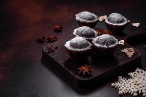 Sweet tasty fresh festive baking on a dark concrete background photo