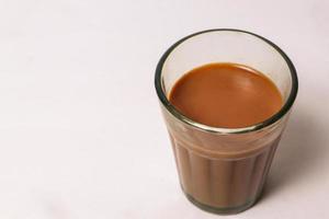 Fresh milk tea or Indian Kadak Chai. photo