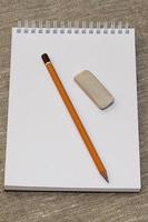 pencil eraser and clean the notebook photo