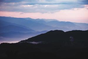 sunrise and sunset in mountains, Layers of mountain  Beautiful dark mountain landscape photo