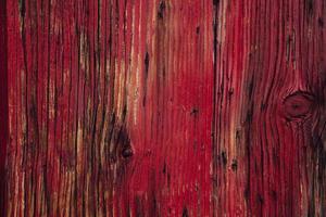 fondo de textura de madera pintada de rojo oscuro foto