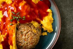 Flavored Fried Rice in an Omelet Wrapping photo