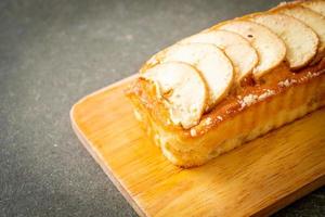 apple loaf crumbled on wood board photo