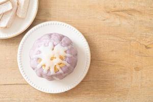 taro bun with white sugar cream and nut photo