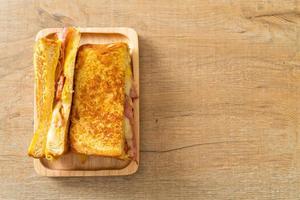 French toast ham bacon cheese sandwich photo