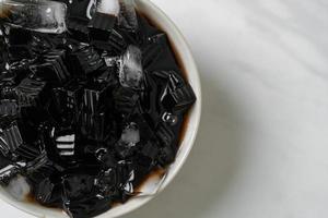 Black grass jelly with ice photo