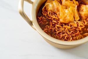 Korean instant noodles with dumplings photo