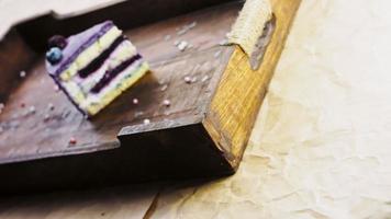 Provencal cake with blueberries and lavender on a wooden tray with decorations video