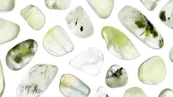 Prehnite rare jewel texture on white light isolated background. Moving right seamless loop backdrop. video