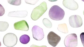 Fluorite rare jewel stones texture on white light isolated background. Moving right seamless loop backdrop. video