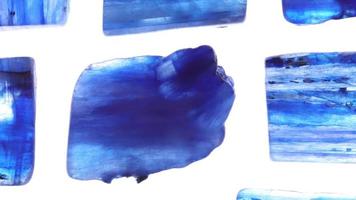 Kyanite jewel texture on light surface background. Moving right seamless loop backdrop. video