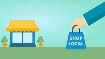 ilustração em vídeo de uma mão segurando uma sacola que diz loja local, com uma imagem de loja, ilustração de sábado para pequenas empresas video