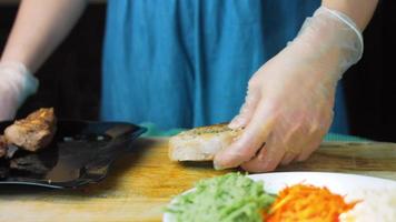 The chef grills pork and beef on the grill video