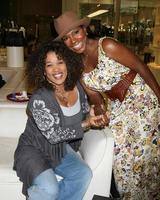 Kym Whitley and Sheryl Lee Ralph as they are shopping for shoes and purses in Sherman Oaks, CA on October 9, 2008 photo