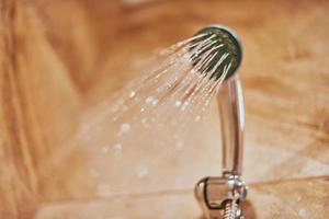 Showerhead in bathroom. photo