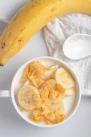 Cornflakes breakfast, banana, fresh milk, healthy food photo