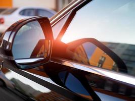 Anti-glare rearview mirror on a black car. photo