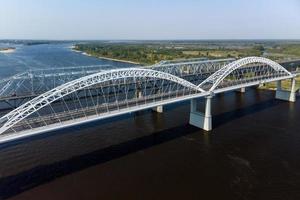 Road bridge over the river, filmed on a copter. photo