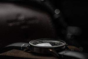 Old vintage watch on leather strap photo