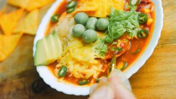 Mexican soup with three kinds of cheese. Royal soup with added avocado and peanuts with vasabi. I use romantic entourage and gold spoon video