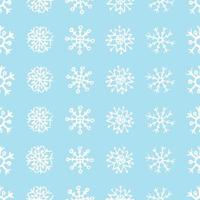 Seamless background of hand drawn snowflakes. White snowflakes on blue background. Christmas and New Year decoration elements. Vector illustration.