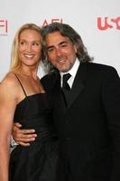 Kelly Lynch and Mitch Glazer arrive at the AFI Salute to Warren Beatty at the Kodak Theater in Los Angeles, CA June 12, 2008 photo